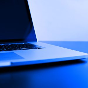 Apple laptop with blue overlay